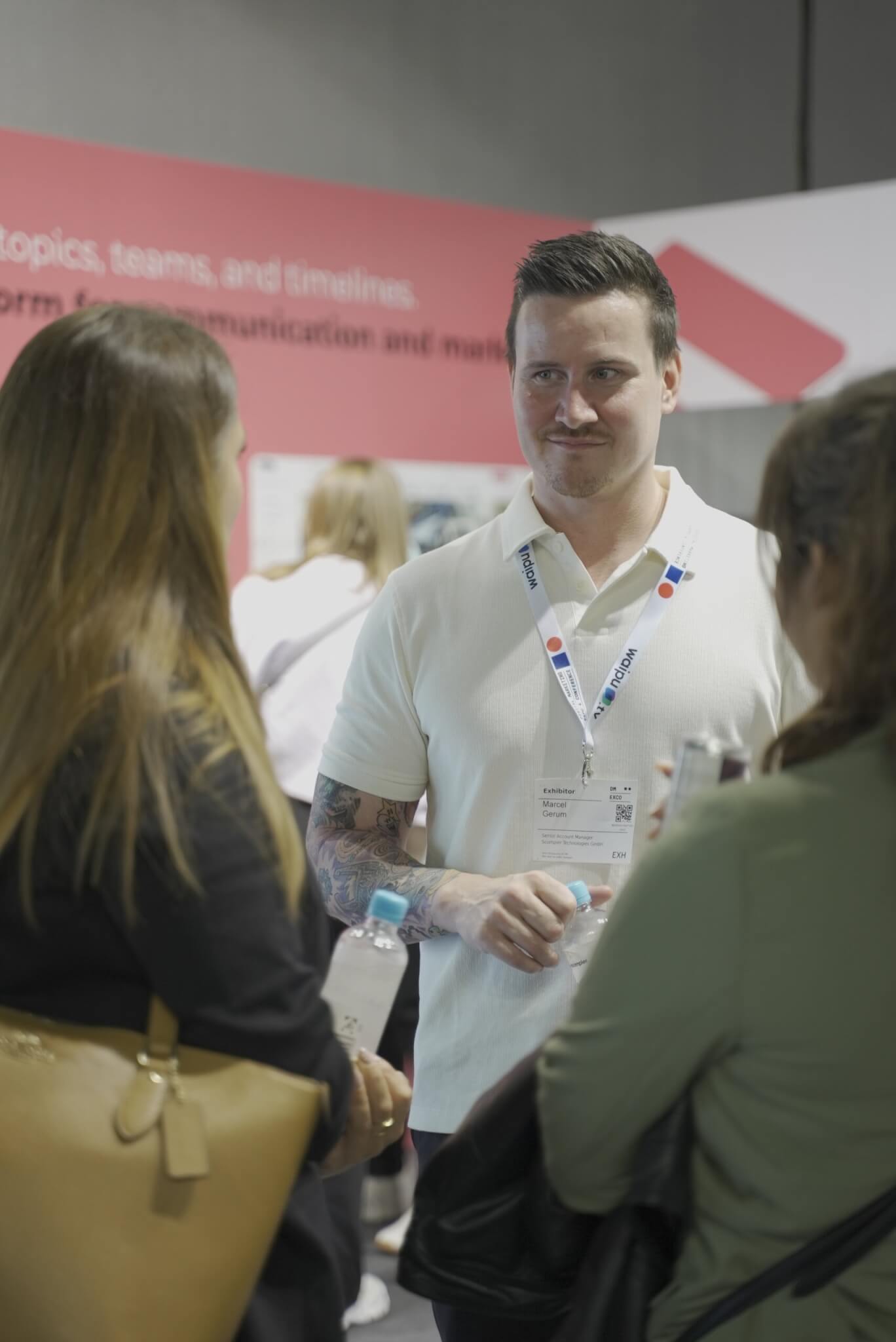 Scompler consulting at the exhibition booth during the DMEXCO event in Cologne.