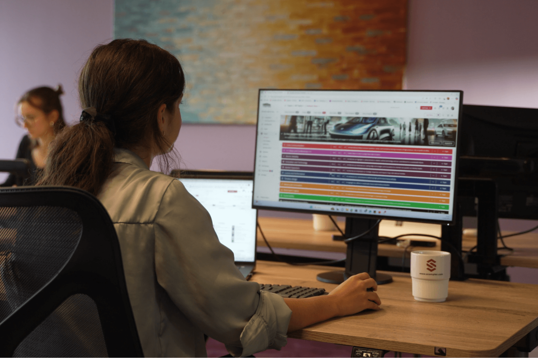 Employee uses scompler software on PC. Request a demo now for optimized project planning and request management.